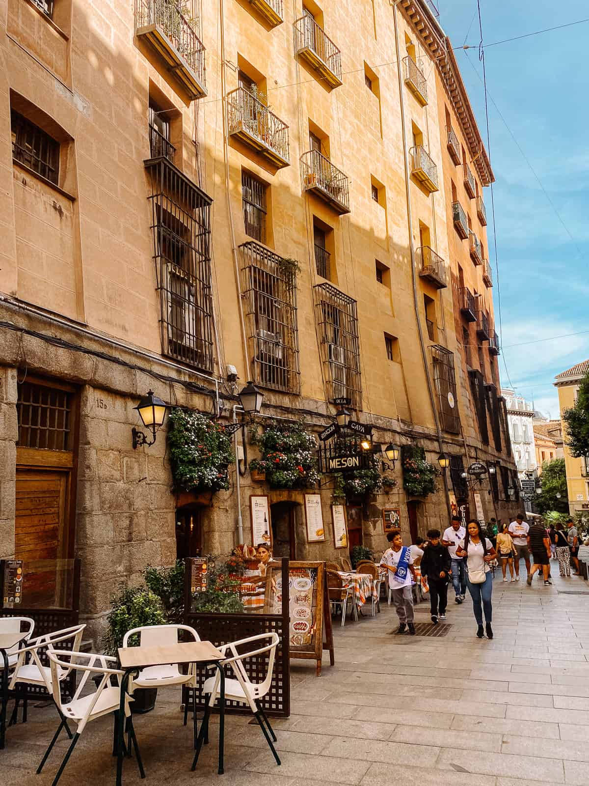 Old buildings on a cobblestone street in Madrid