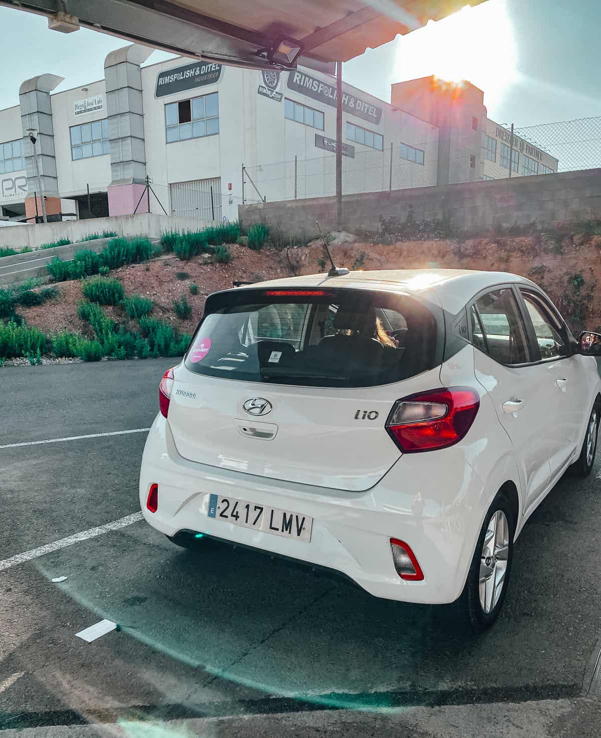 a photo of a white car at a car rental in Mallorca Spain