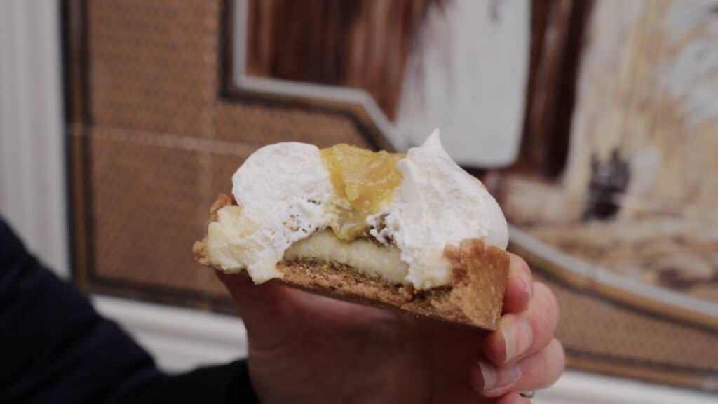 Lemon and pistachio pastry from ALMA in Lyon, with a fluffy marshmallow-like topping and creamy citrus filling